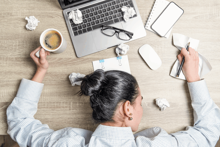 Tired employee asleep at desk
